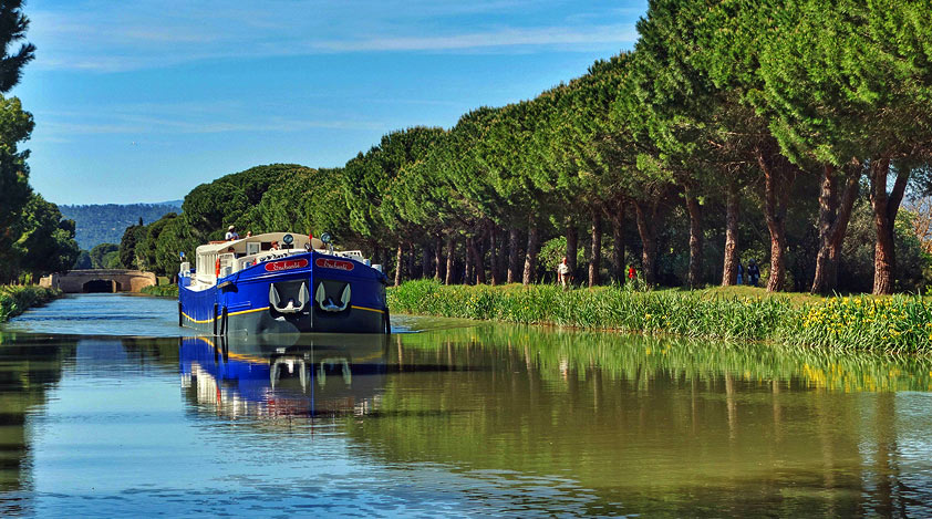 The Enchante barge cruising the Canal du Midi