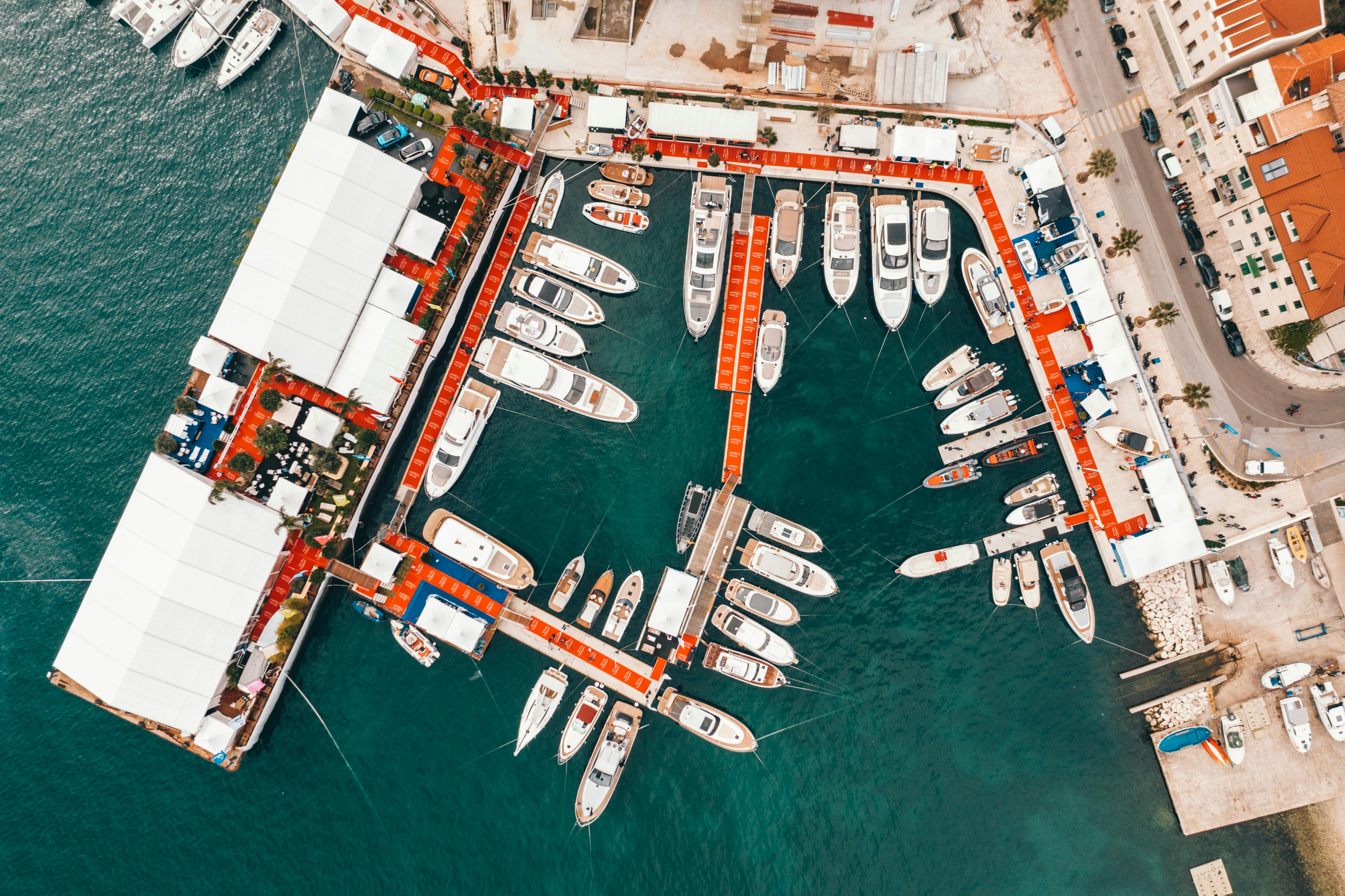 A vibrant harbour town along Croatia’s coastline is dotted with modern boats