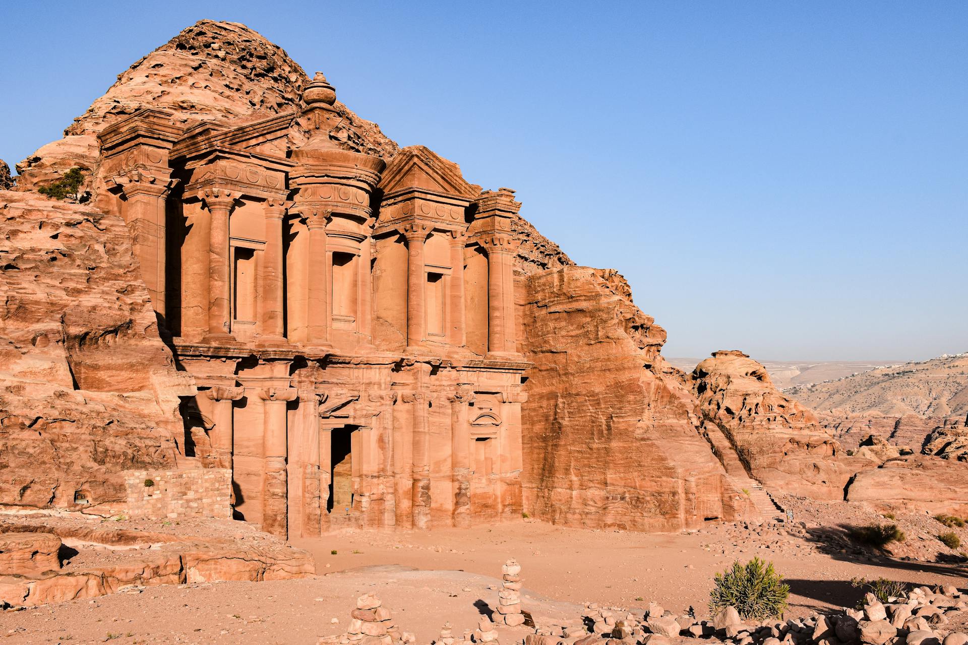 A historical structure in Jordan surrounded by rock formations