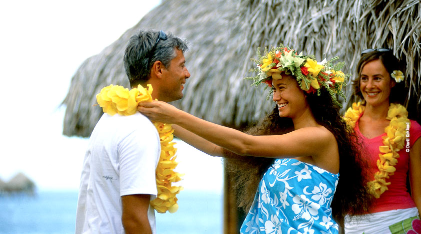 Flowers, tattoos and warm smiles - the hallmarks of Tahitian way of life.