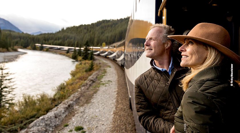 Couple enjoying the view from the GoldLeaf service outdoor viewing platform.