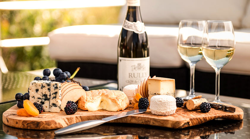 Sample local cheeses and wines on a gastronomy cruise